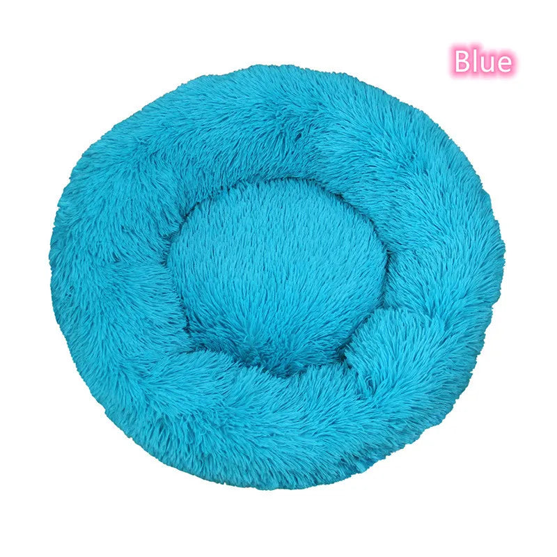 KIRE™ Ultra-Plush Calming Donut Bed in bright blue, top-down view, soft cozy material for pets.