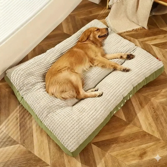 KIRE premium pet cooling mat in green and grey with quilted texture, shown with a dog resting comfortably on top.