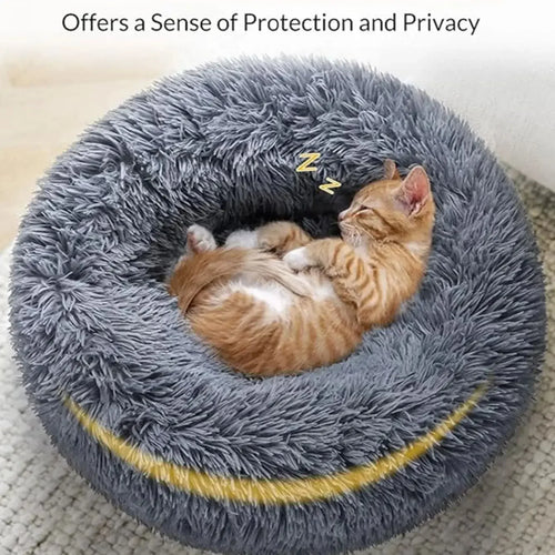 KIRE Ultra-Plush Calming Donut Bed in grey with soft faux fur, side view showing cozy, secure design for pets.