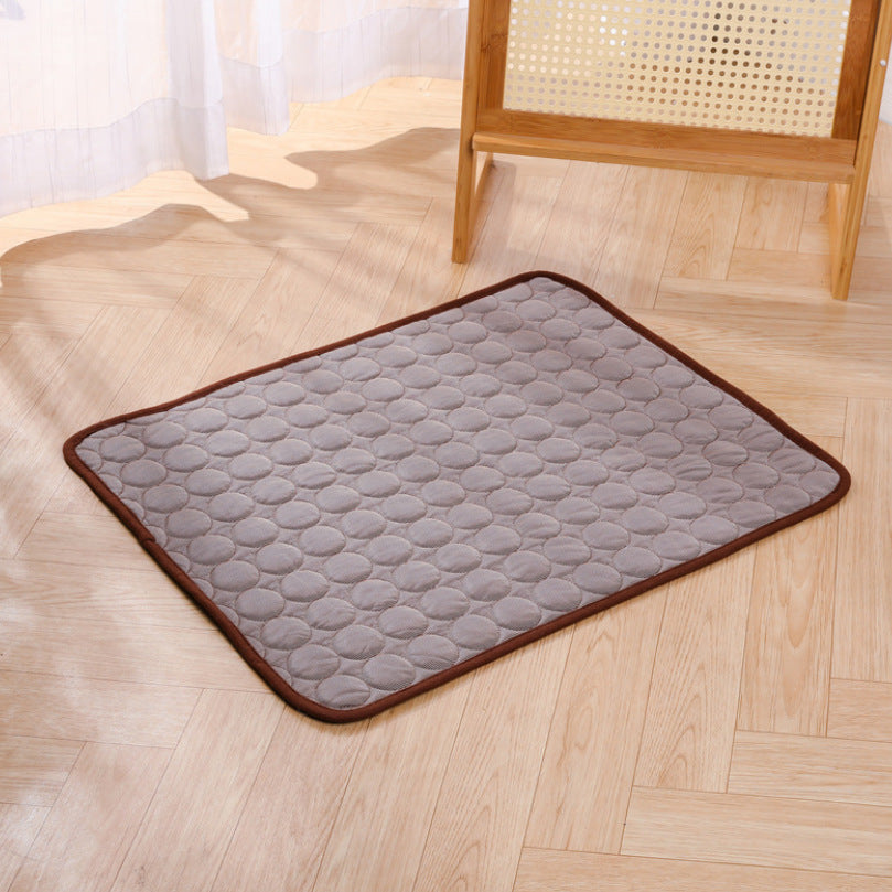 Brown KIRE™ Glacier-Touch cooling mat placed on wooden floor - Minimalist design for modern homes